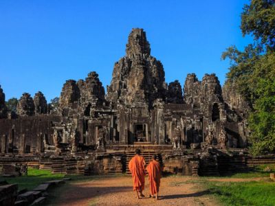 Bayon Temple Angkor Thom Siem Reap Cambodia with monks walking