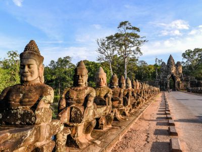 Ancient stone statues at Angkor Thom Siem Reap Cambodia temple complex